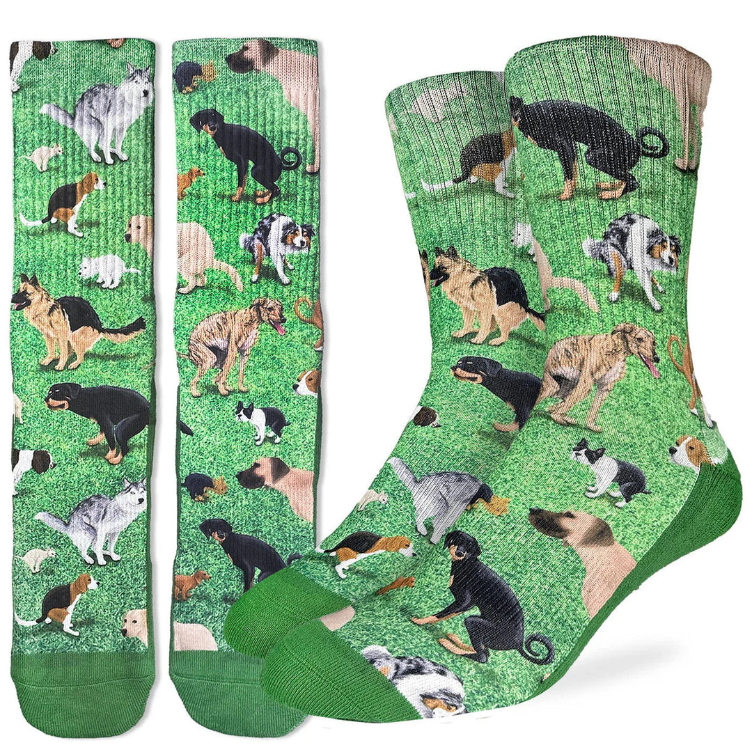 Men's dogs pooping crew socks flat lay, dog breeds squatting on green grass