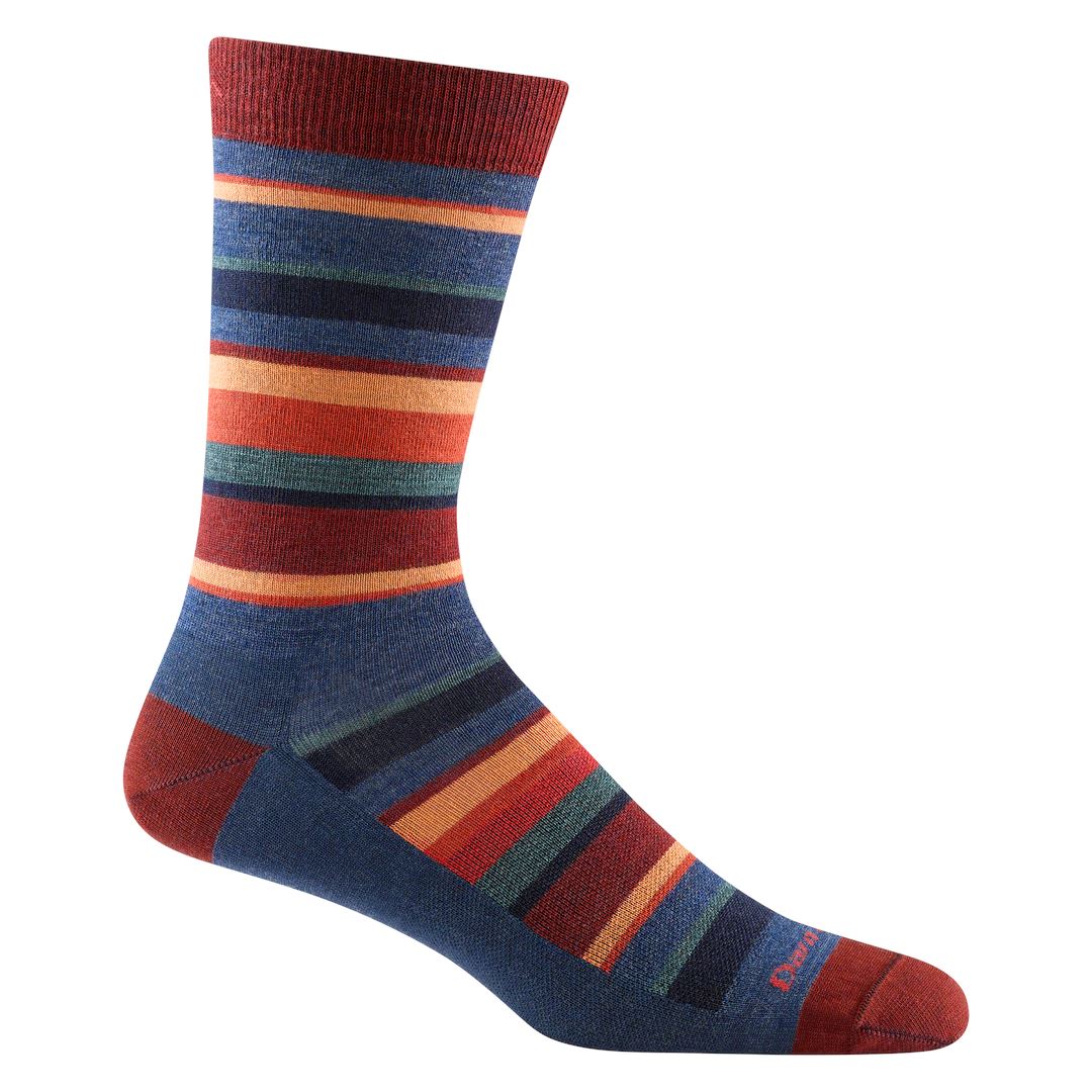 Men's denim blue crew sock with rust, peach and teal stripes, flat product shot