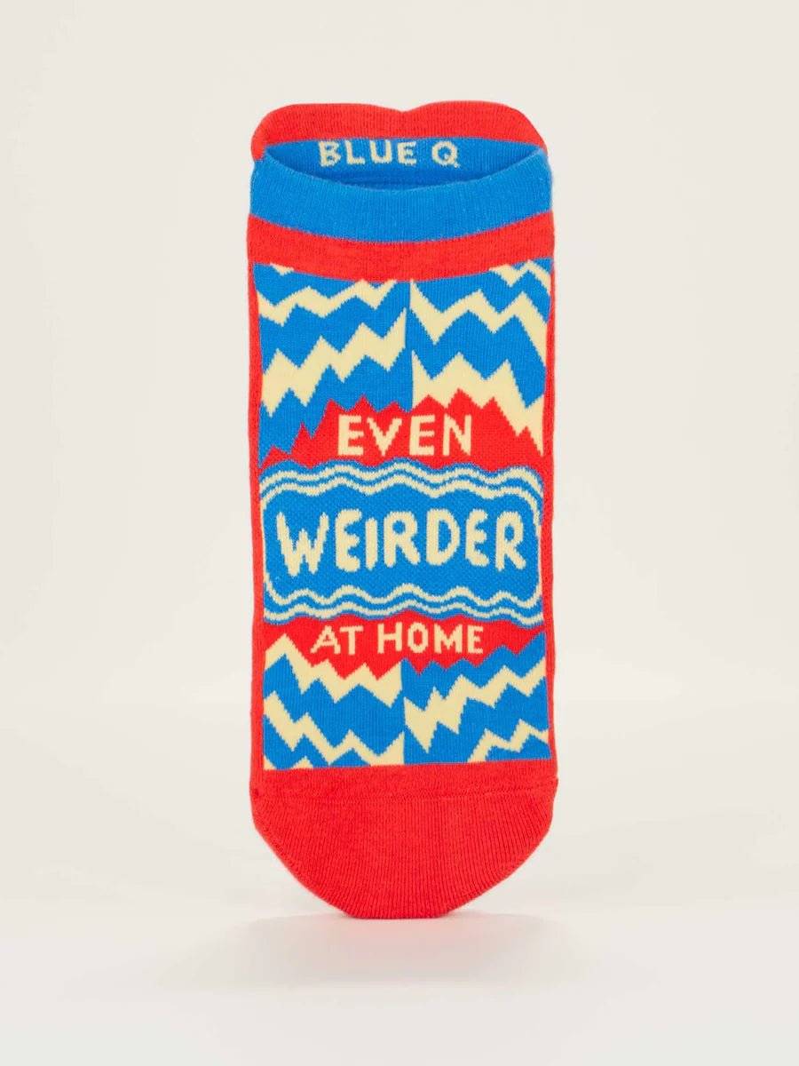 Women's Even Weirder At Home sneaker socks, flat top view with red text on blue and yellow chevrons