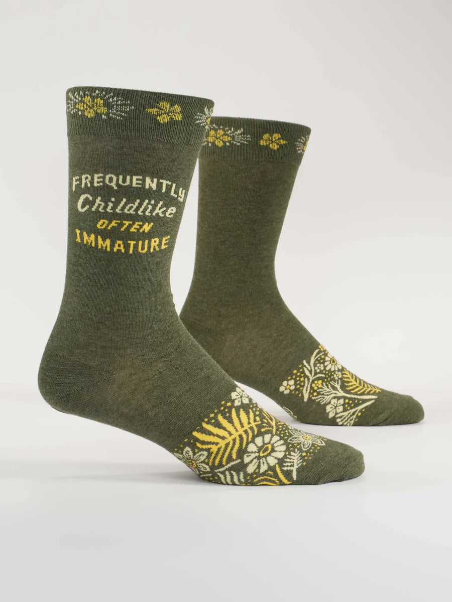 Men's Frequently Childlike Often Immature crew socks, flat side view in olive with gold floral print