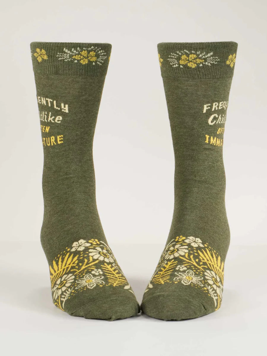Men's olive crew socks, flat front view showing gold botanical pattern at the toes
