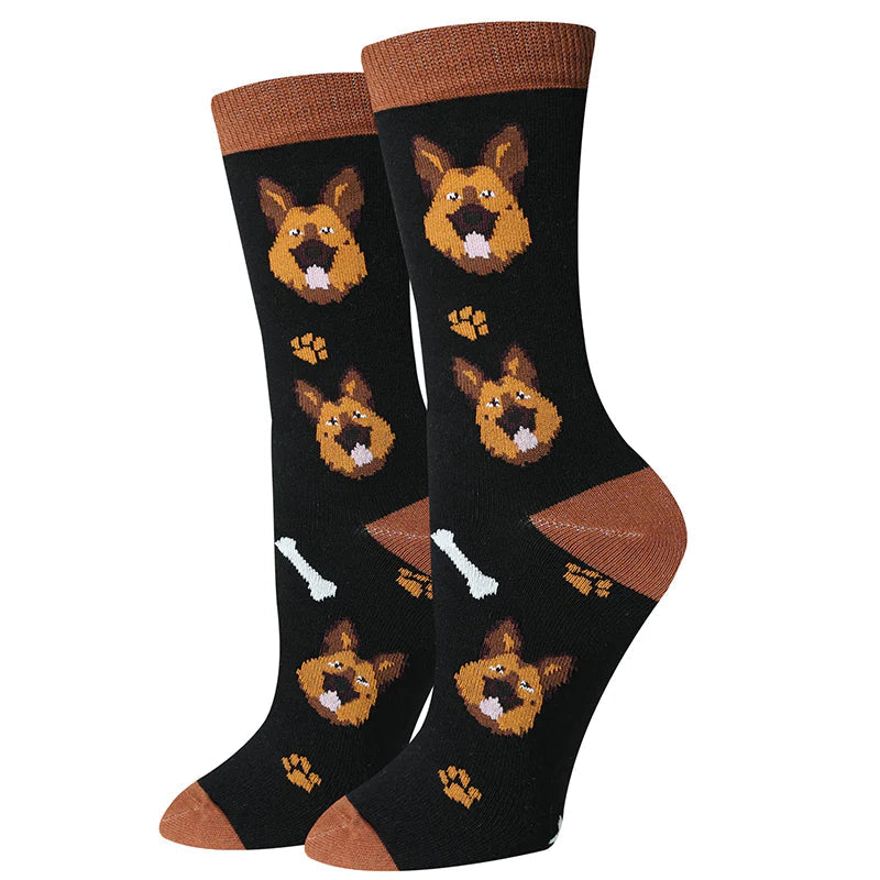 Women's German Shepherd crew socks flat lay, black with tan and black shepherd faces and paw prints