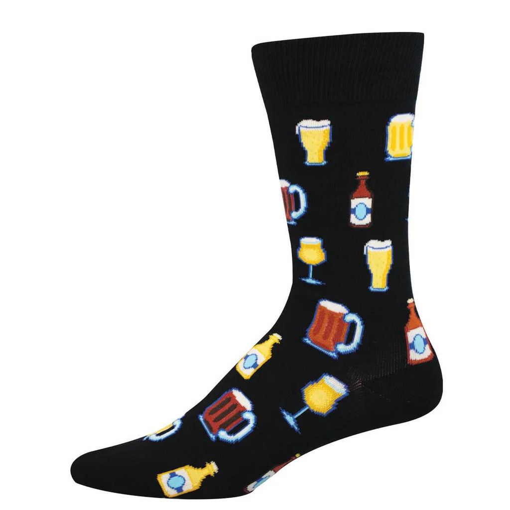 Men's beer crew socks flat lay on black with mugs, pints, and bottles of golden beer