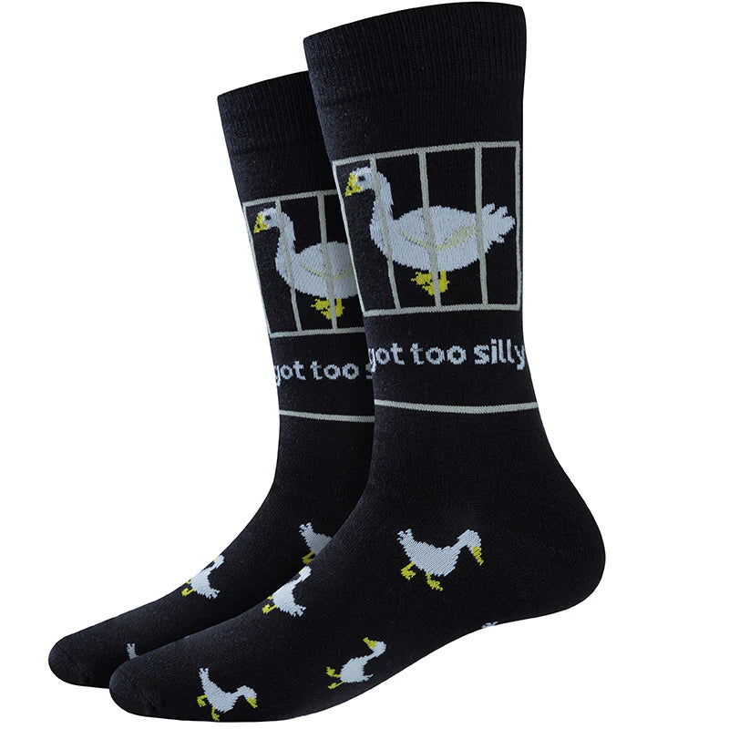 Men's black crew sock, flat front view with a goose behind bars and geese around the foot