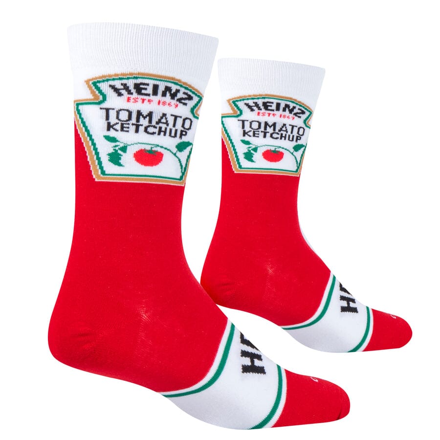 Pair of Heinz Tomato Ketchup crew socks standing upright, showing the full bottle-inspired design