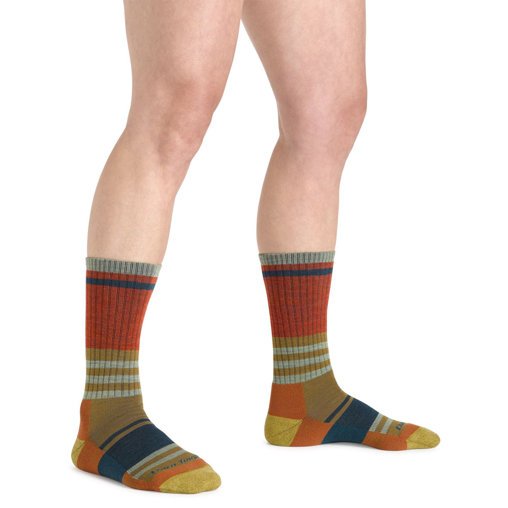 Women's sandstone striped boot socks worn on both feet, side view