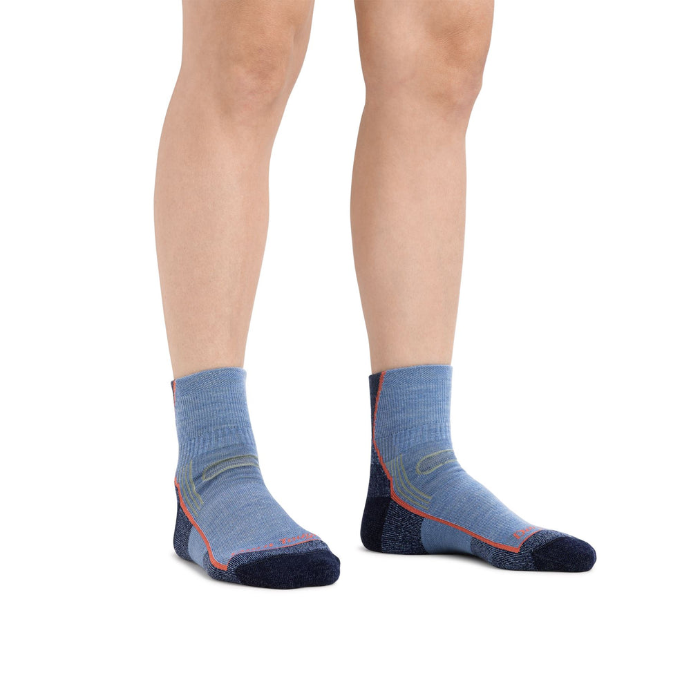 Women's dusk denim hiking quarter socks worn on both feet, front view