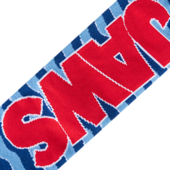 Close-up of red JAWS lettering on men&