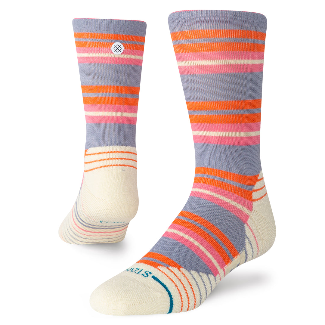 Women's striped performance crew socks in pink and orange, flat angled view
