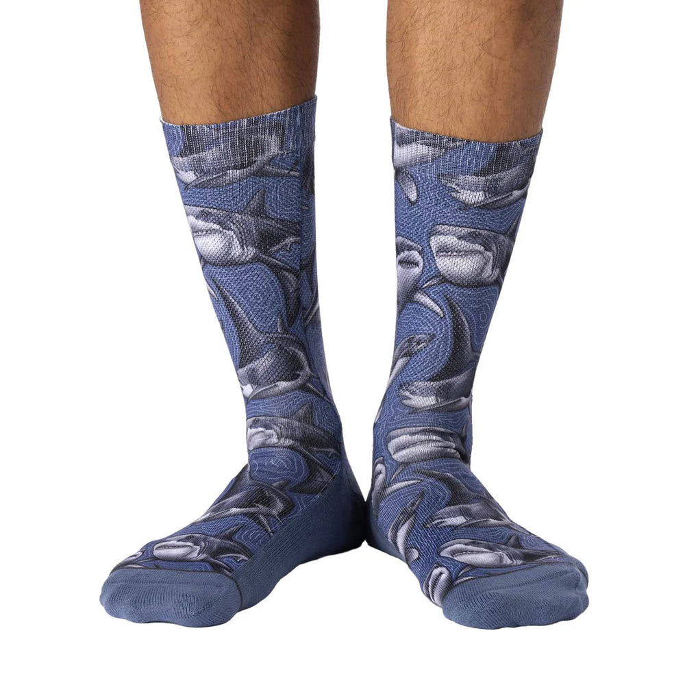 Men's blue great white shark crew socks, worn front view