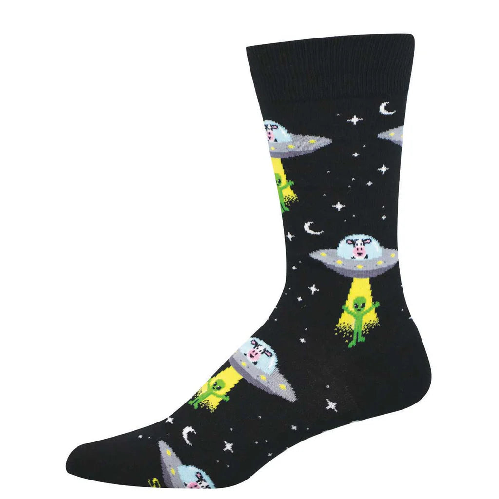 Men's alien cow crew socks flat lay in black with flying saucers abducting cows in starry space