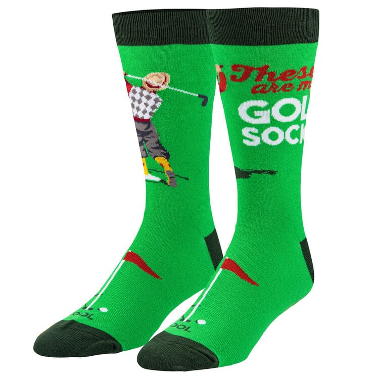 Men's golf crew socks, front view with golfer and slogan on green