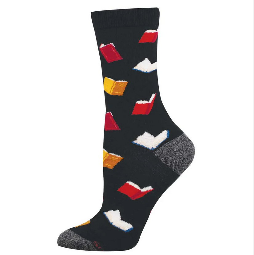 Women's book crew socks laid flat, black with open hardcover books in red, yellow, and cream
