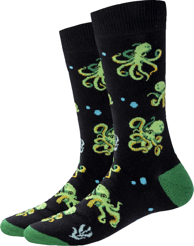 Men's octopus crew socks in black with green octopuses, flat lay