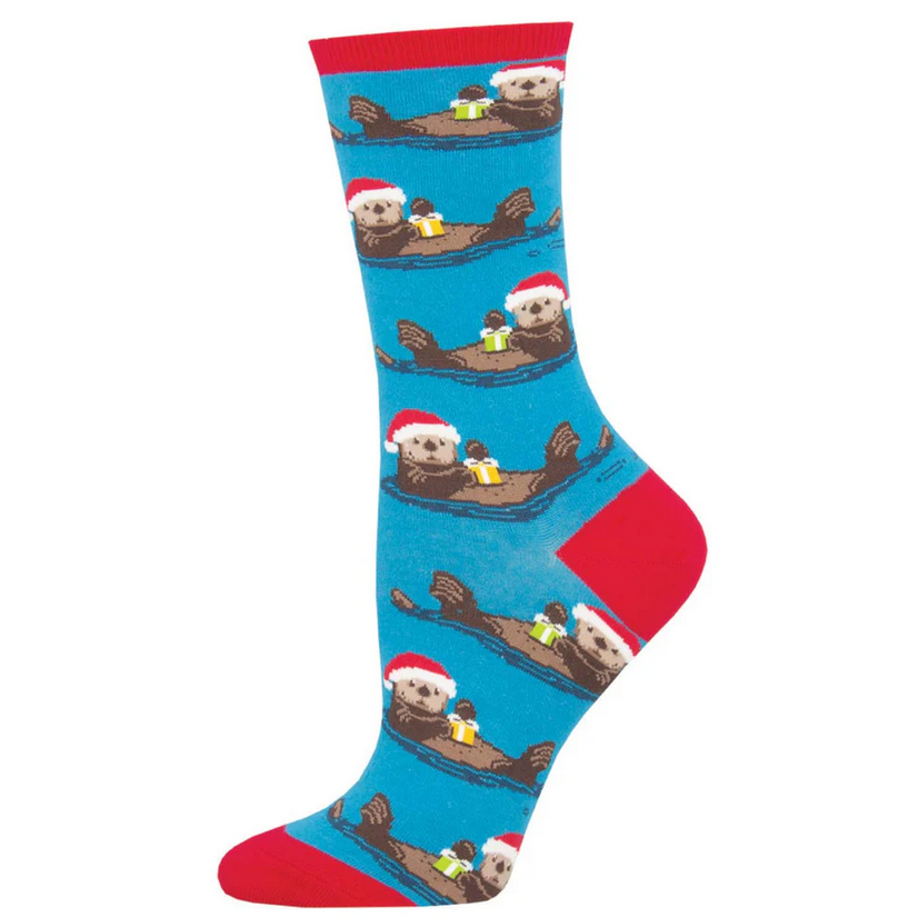 Women's holiday sea otter crew socks in blue with Santa-hat otters, flat lay single sock