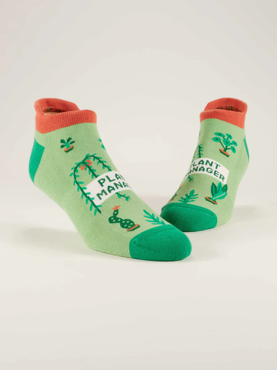 Women's green Plant Manager low-cut socks, flat side view showing coral cuff
