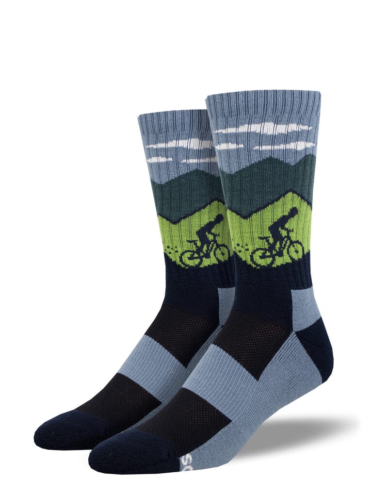 Men's Ride On merino wool crew socks, flat front view with a green mountain biker silhouette and mountain skyline