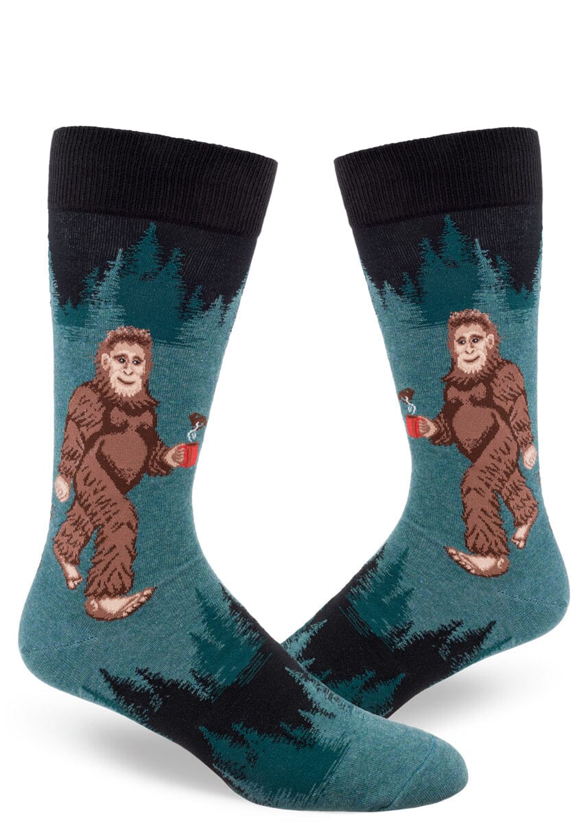 Men's Sasquatch loves coffee crew socks shown flat with Bigfoot holding a coffee mug
