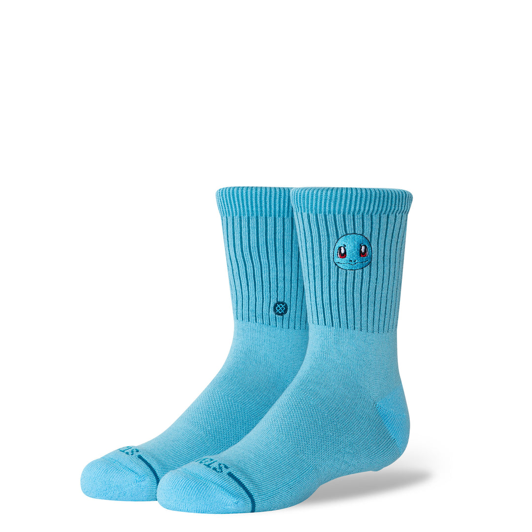 Kids' Squirtle aqua blue crew socks, angled view with embroidered Squirtle face