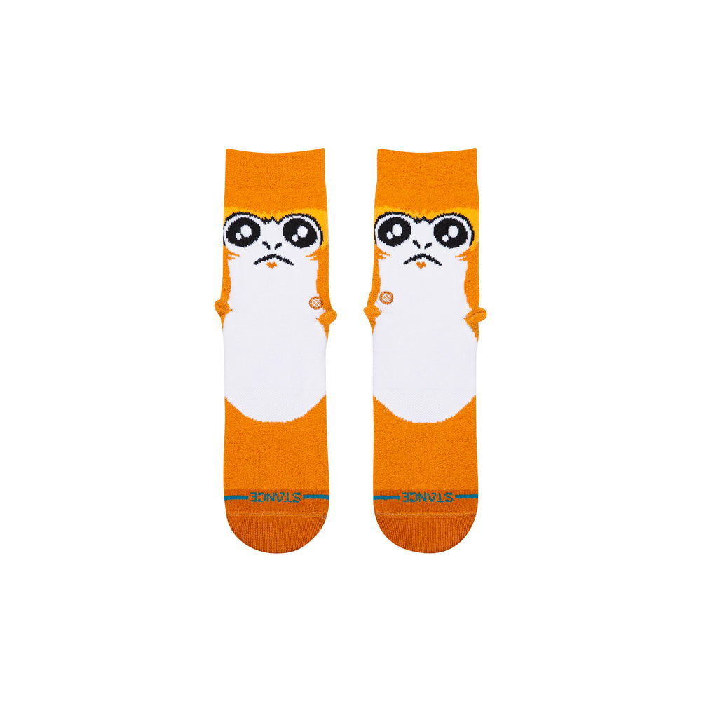 Kids' Porg fuzzy orange crew socks, flat front view of big-eyed creature
