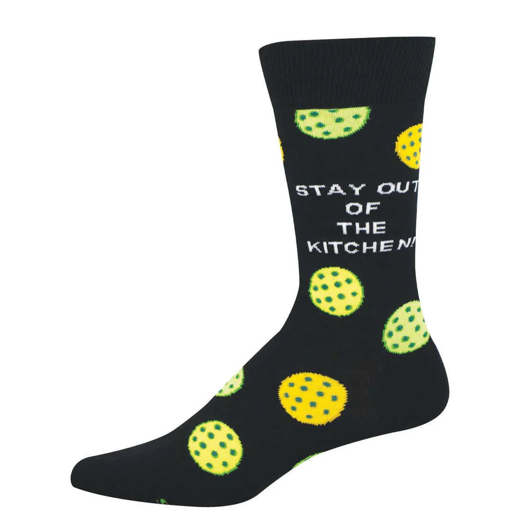 Men's pickleball crew socks flat lay in black with neon pickleballs and Stay Out of the Kitchen text