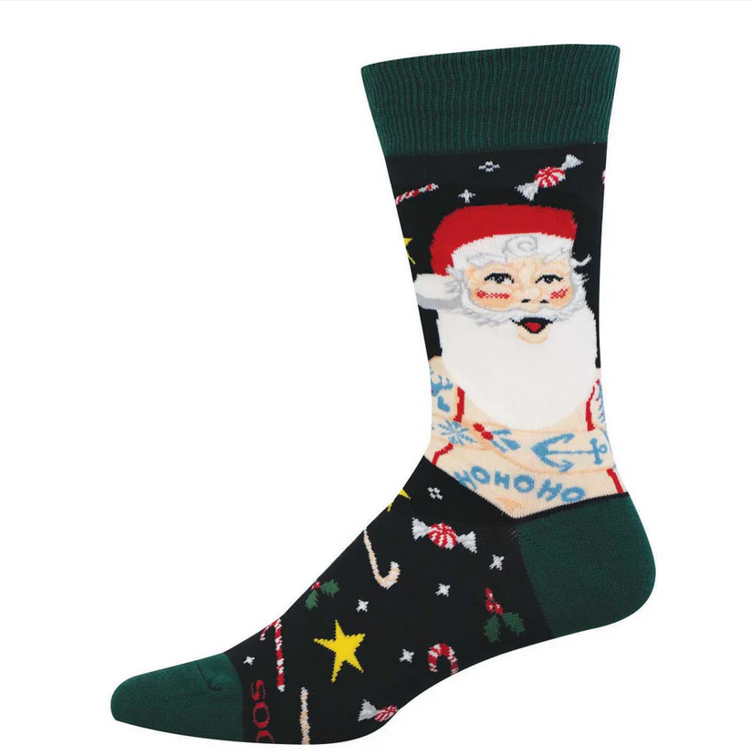 Men's bad Claus crew socks laid flat, black with a flexing retro pin-up Santa and candy canes and stars