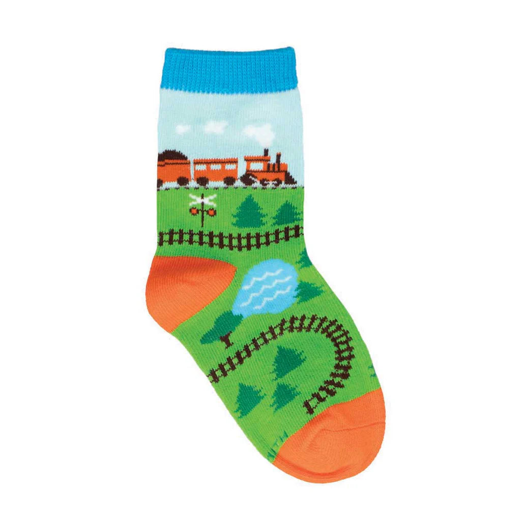 Kids' green crew sock with steam train, tracks and pine trees scene, flat product shot
