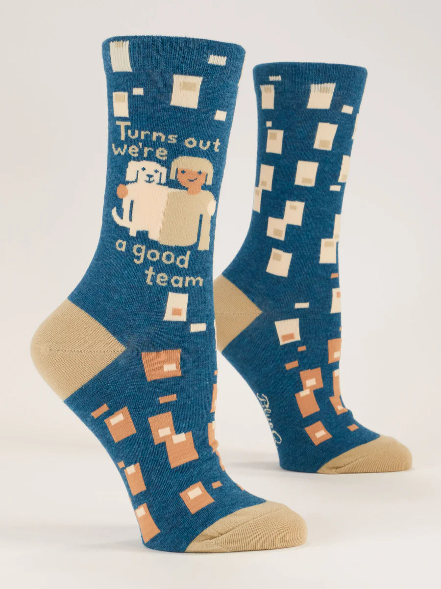 Women's Turns Out We're A Good Team crew socks, flat side view in blue with two cartoon figures