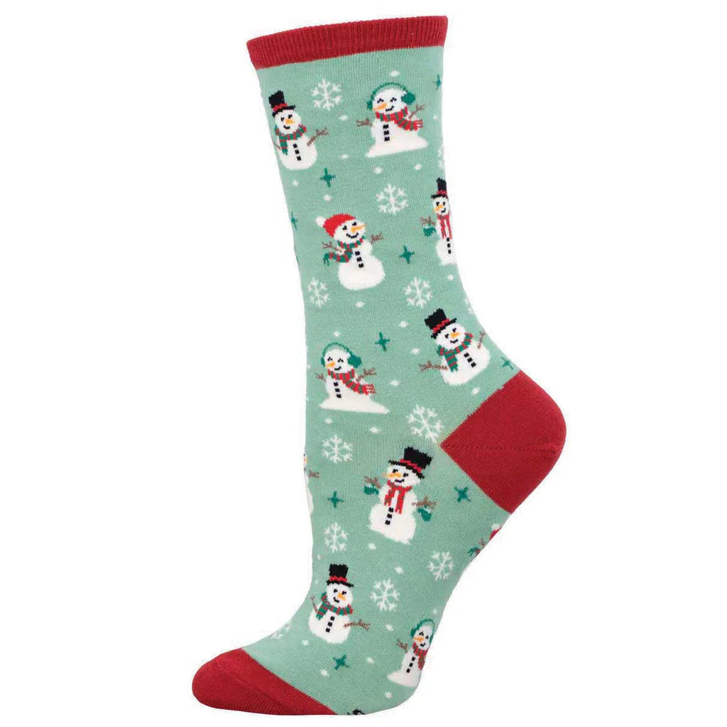 Women's snowman crew socks in sage green with snowflakes, flat lay