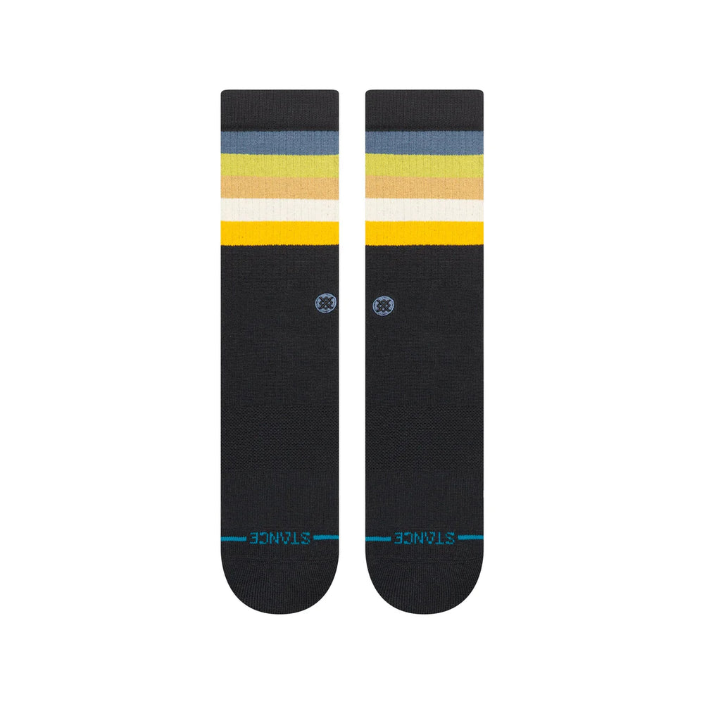 Women's black striped crew socks, flat front view with logo