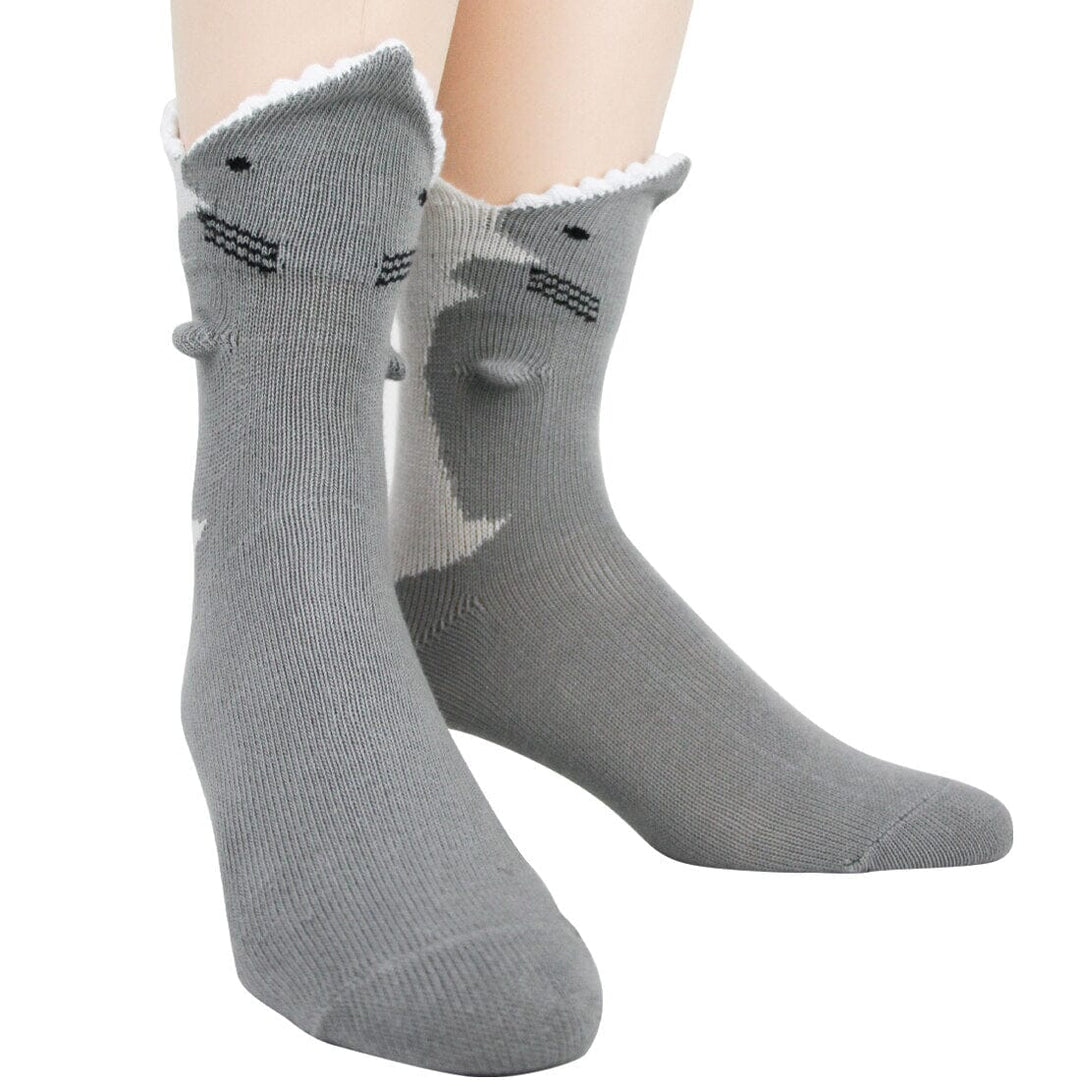 Men's 3D great white crew socks in gray with sculpted shark faces, knit teeth, pop-out fins and white wave-trim cuffs