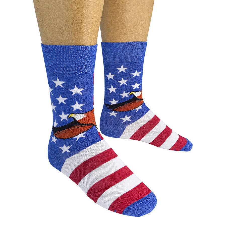 Two flag eagle crew socks worn on a model, stars on the leg and flag stripes down the front