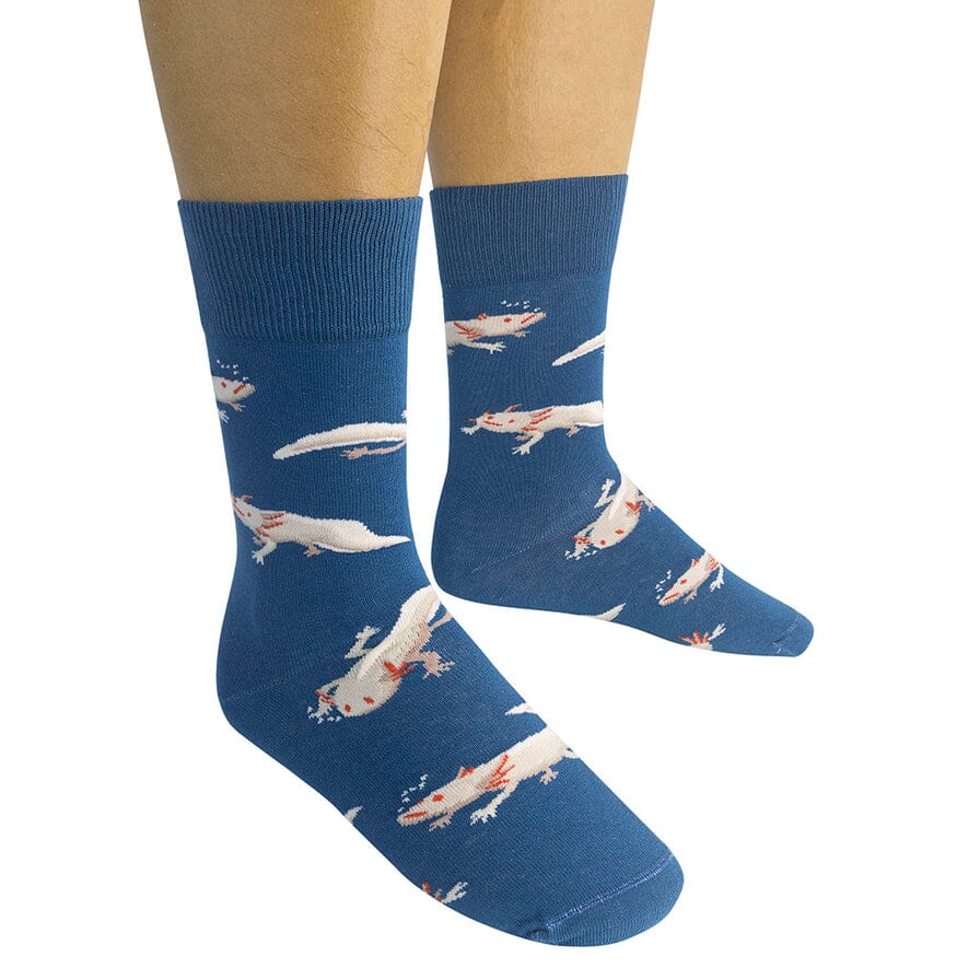 Pair of denim blue axolotl socks worn on a model's legs, front and side views