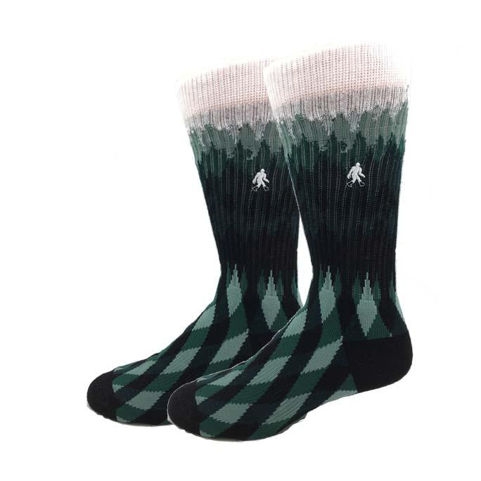 Pair of men's active crew socks fading from white to forest green with a diamond pattern and small Bigfoot embroidery