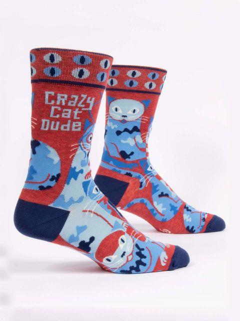 Men's red-and-blue crew socks shown from the side with stylized cats, eyeball-print cuff, and "Crazy Cat Dude" text