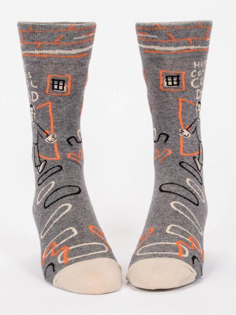 Front-facing view of the pair of charcoal cool dad socks standing upright, showing the doodle pattern and cartoon dad across both legs