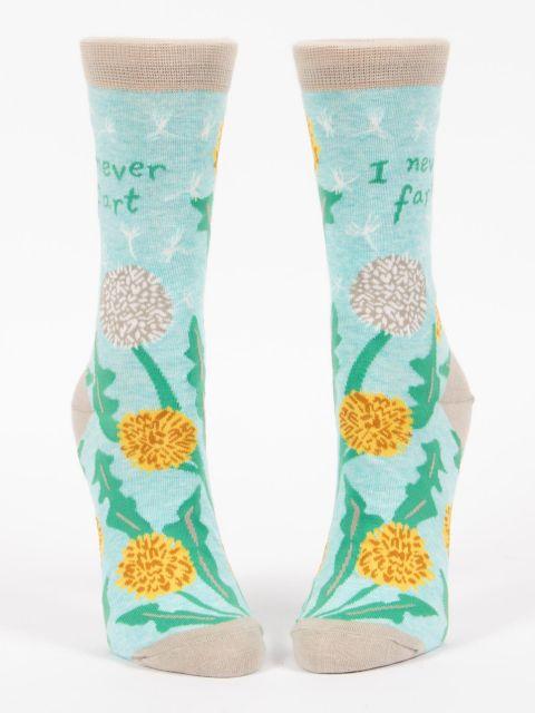 Front view of the dandelion "I never fart" crew socks displayed as a pair with tan heels and toes