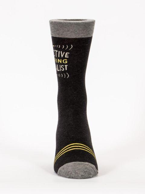 Front view of the Selective Hearing crew sock showing the gray toe, gold stripes, and the slogan partly visible up the leg