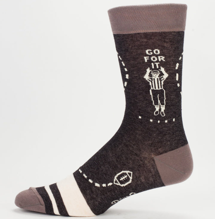 Other side of the socks reading Go For It with a referee figure