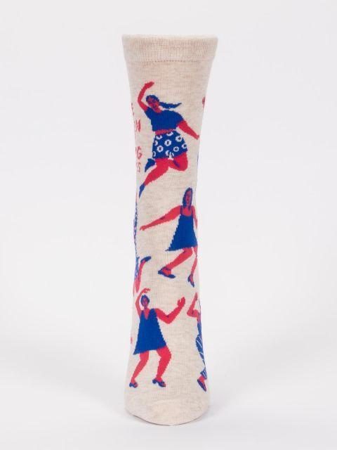 Front-facing view of the oatmeal dancing sock standing upright, showing dancers around the leg and foot