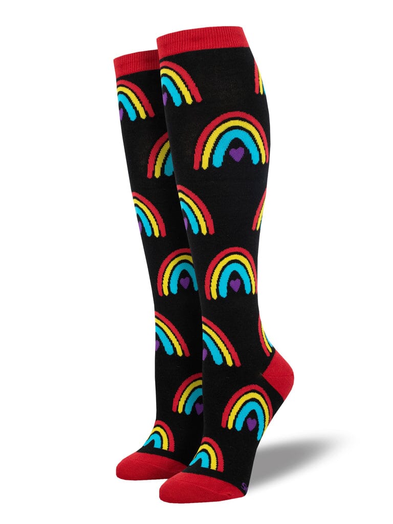 Women's boho rainbow knee high socks in black with red, yellow and turquoise rainbows, flat product shot