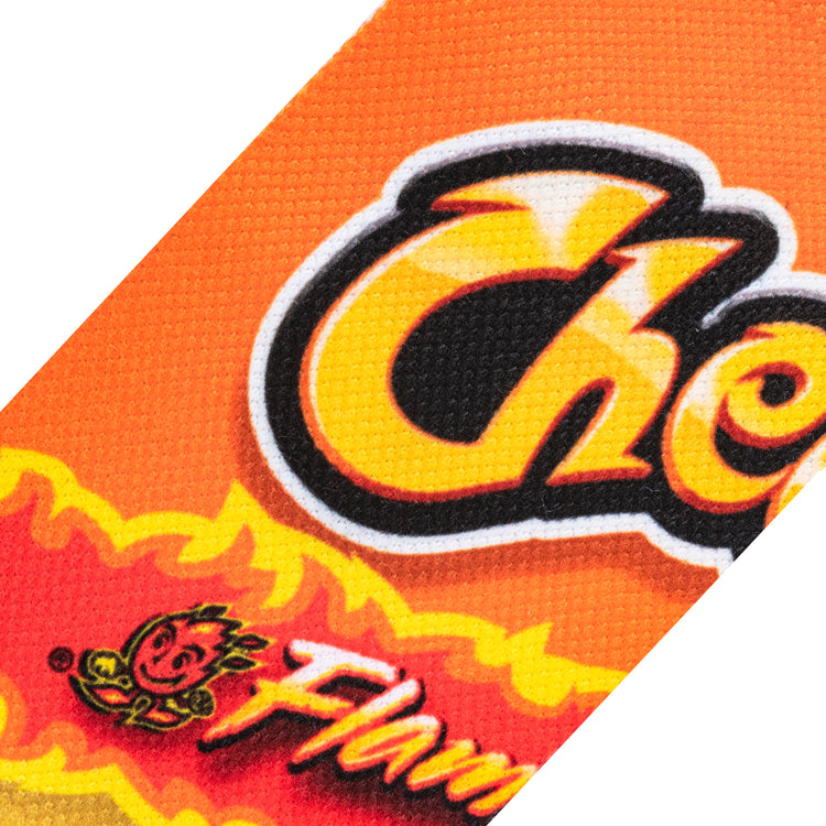 Close-up of the printed Cheetos logo and flame artwork on the sock fabric