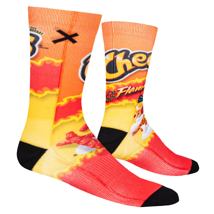 Side angle of the Cheetos socks revealing more of the fiery bag graphic and black heel
