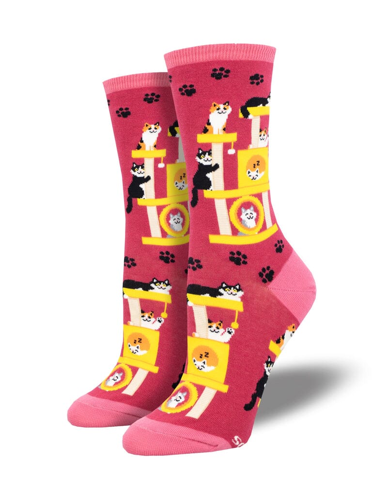 Women's Cool Cats Club crew socks in pink with cats on a cat tree, flat product shot