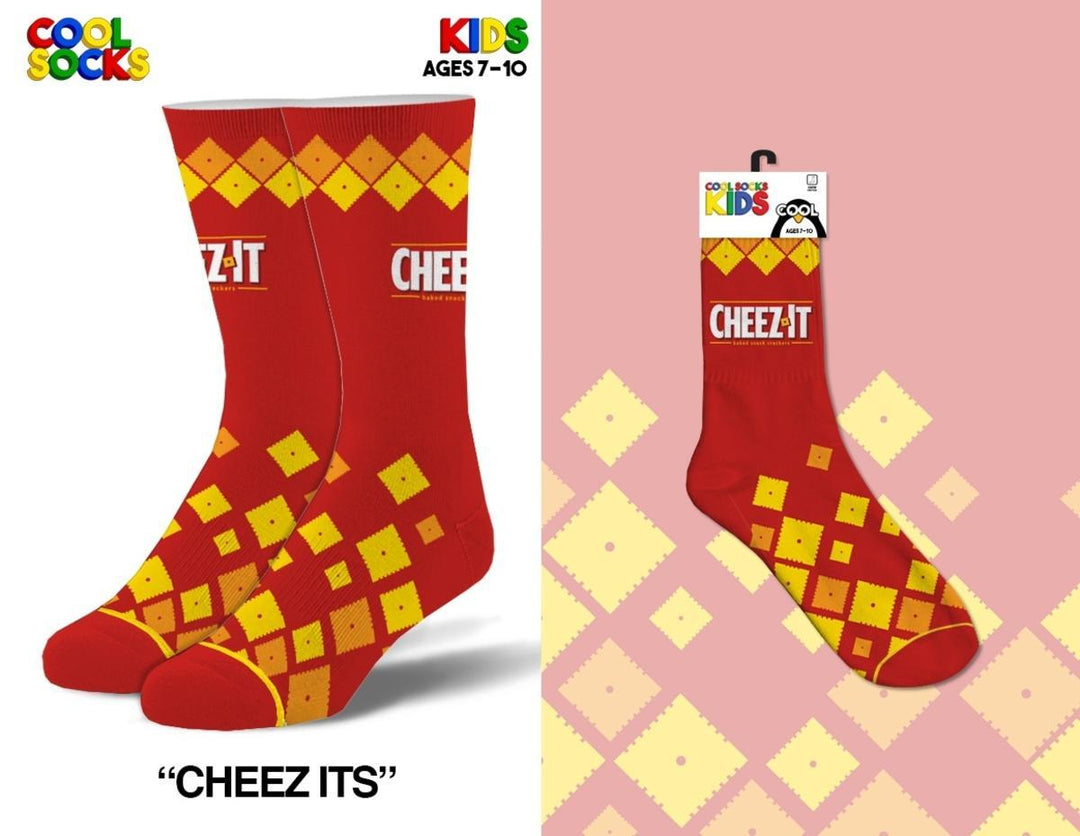 Kids' red Cheez-It crew socks with the bold logo, golden cracker squares, and an argyle band, shown with packaging
