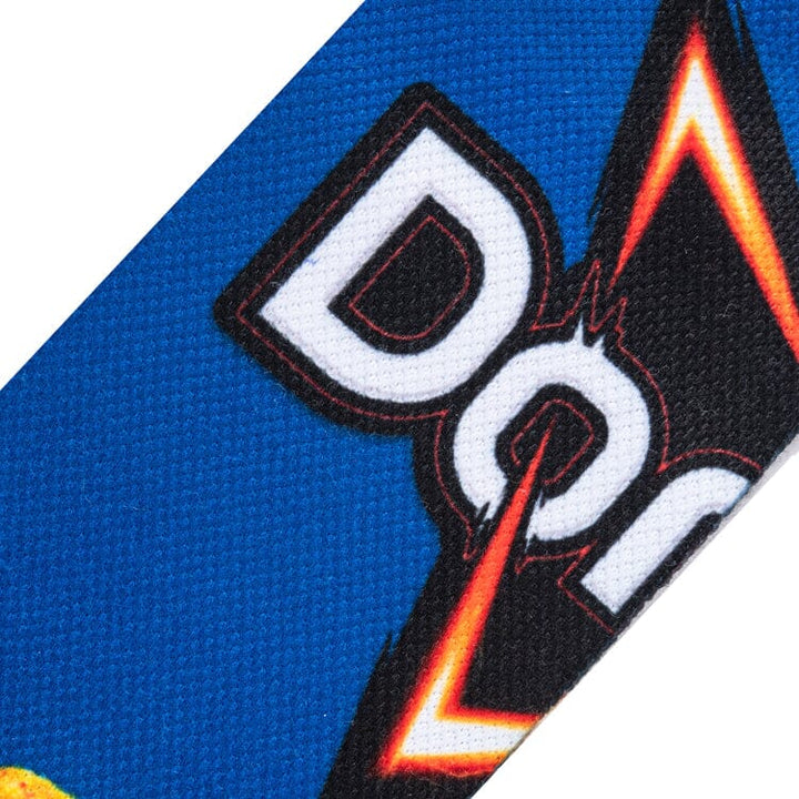 Close-up knit detail of the white Doritos logo lettering on the blue background