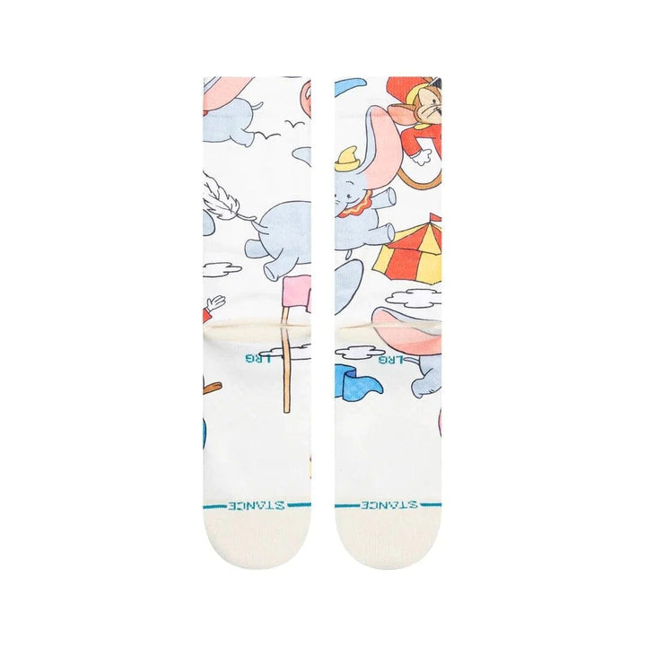 Side leg detail of the Dumbo socks with Dumbo soaring past a circus tent and clouds