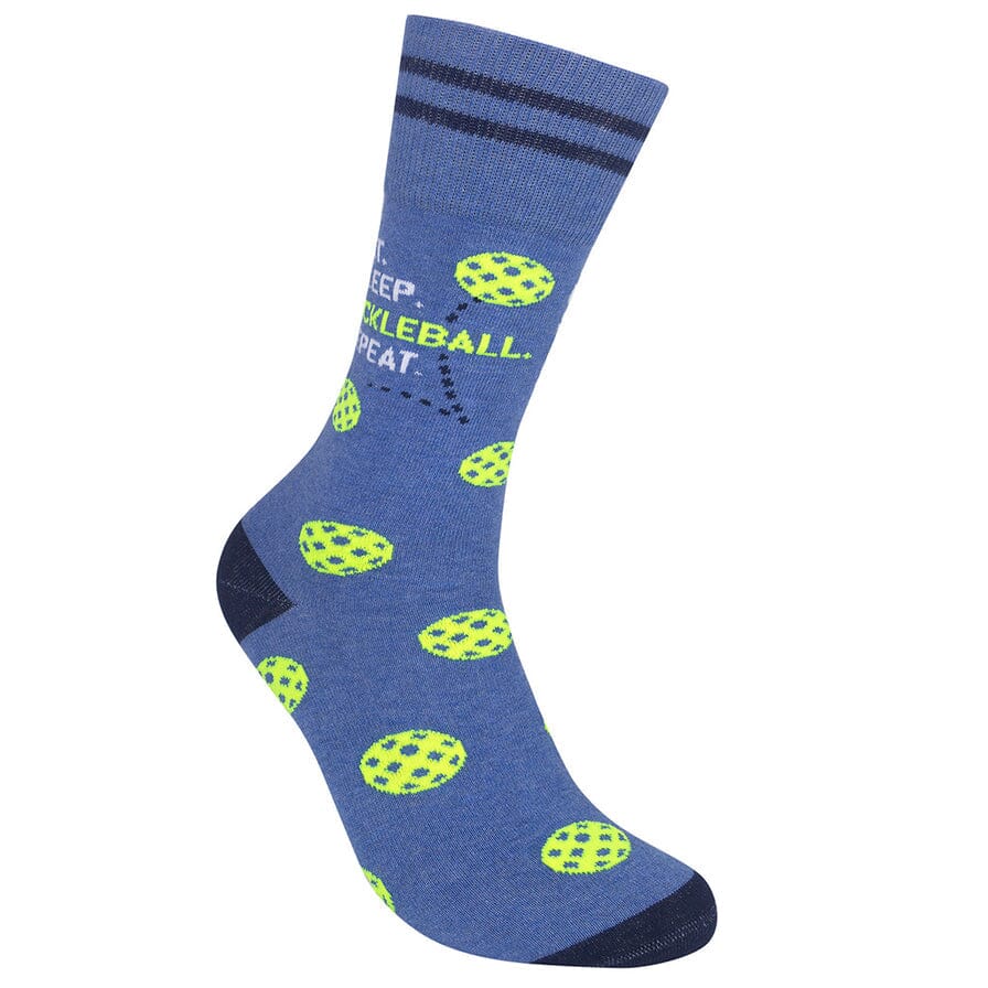 Angled periwinkle pickleball sock with the ball-flight dotted line and partial lettering