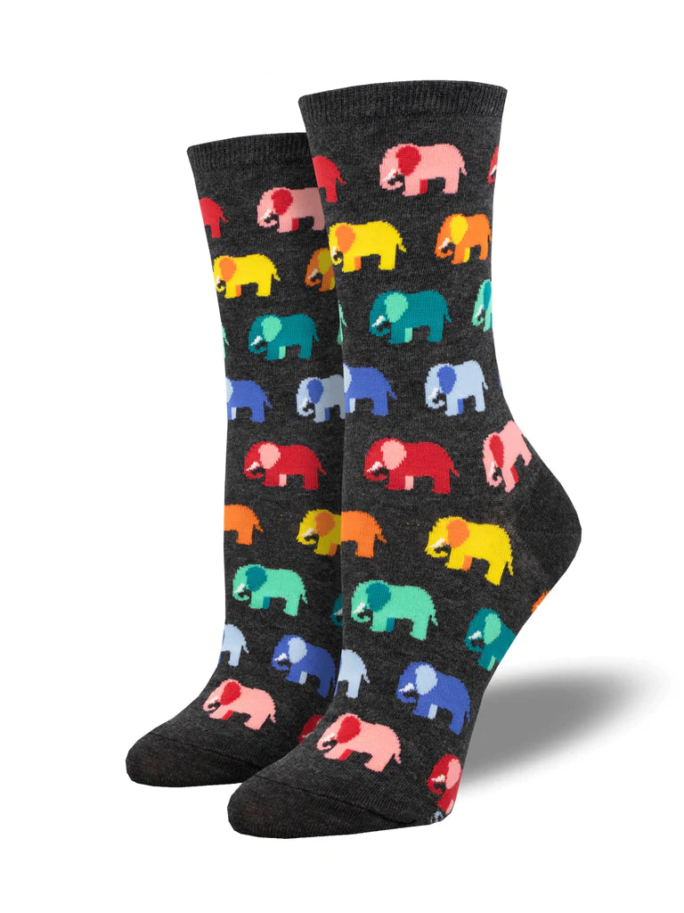 Women's charcoal crew socks patterned with rows of small rainbow-colored elephants marching trunk to tail
