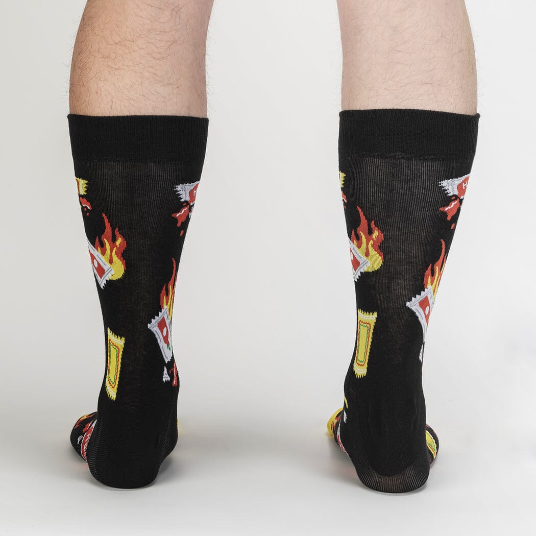 Back view of the black Extra Hot socks on a model&